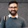 man with eyeglasses smiling