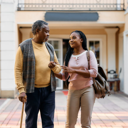 woman smiling at the senior man